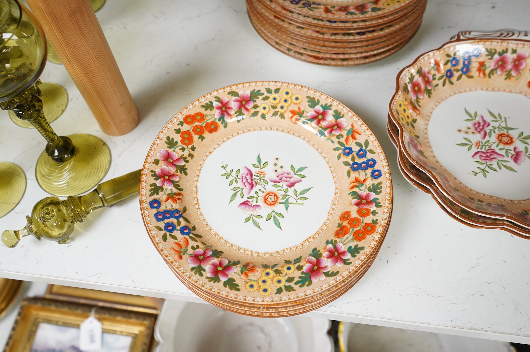 An early 19th century Spode printed and hand painted part dessert service, plates 20cm in diameter